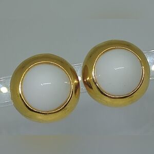 * vintage Kenneth Lane high dome white gold tone clip on earrings